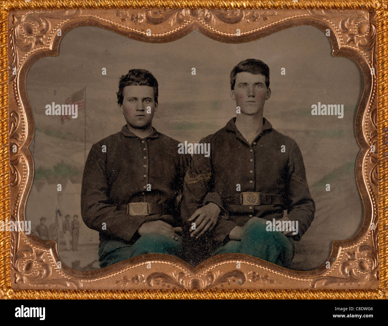 Two unidentified soldiers in Union uniforms in front of painted ...