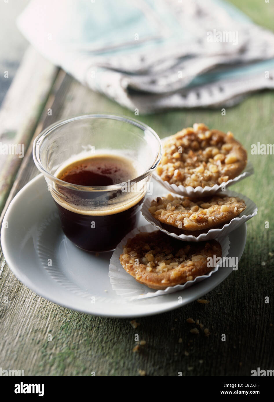 Coffee and small almond cookies Stock Photo