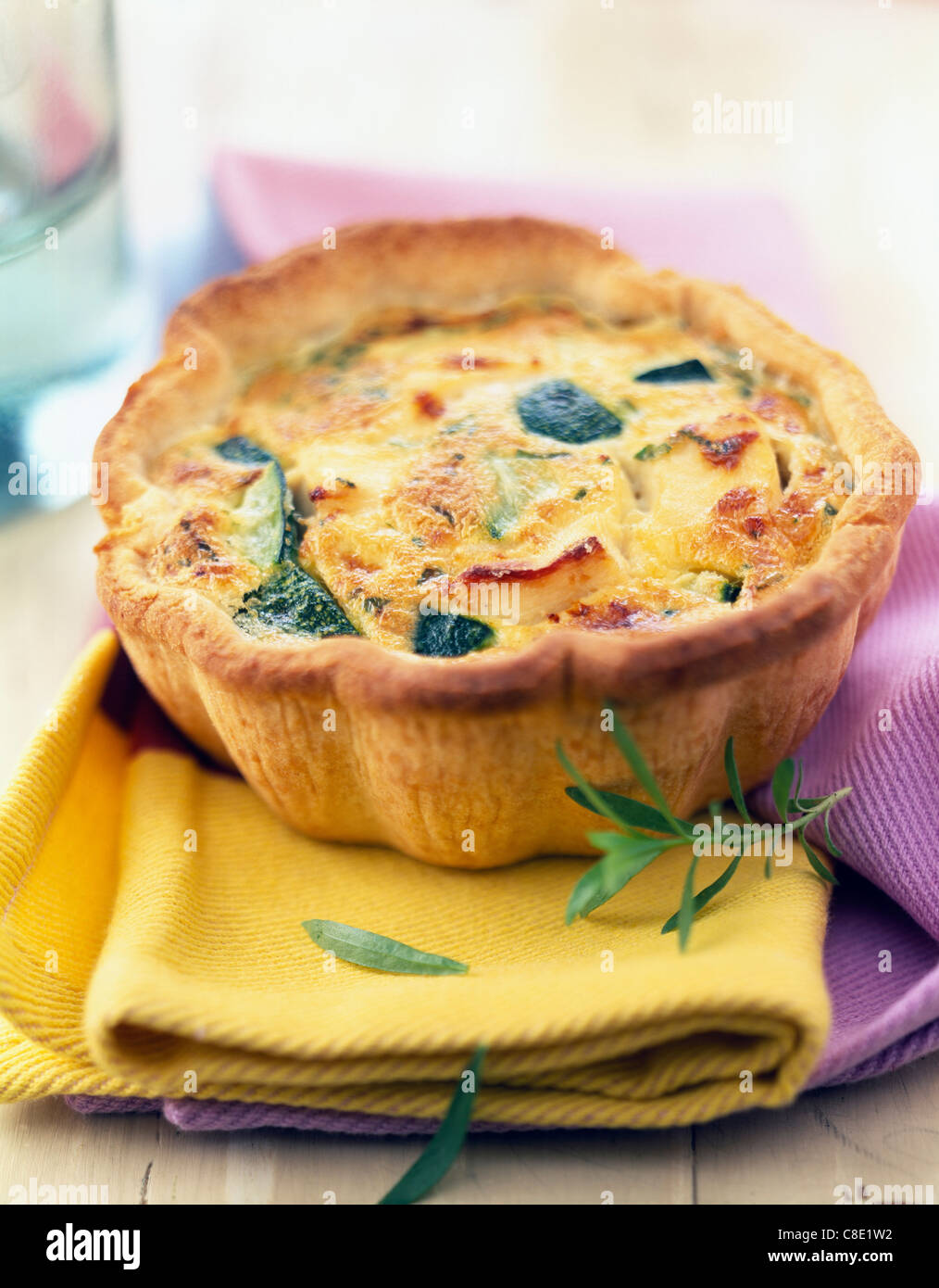 Chicken,zucchini and tarragon savory tart Stock Photo