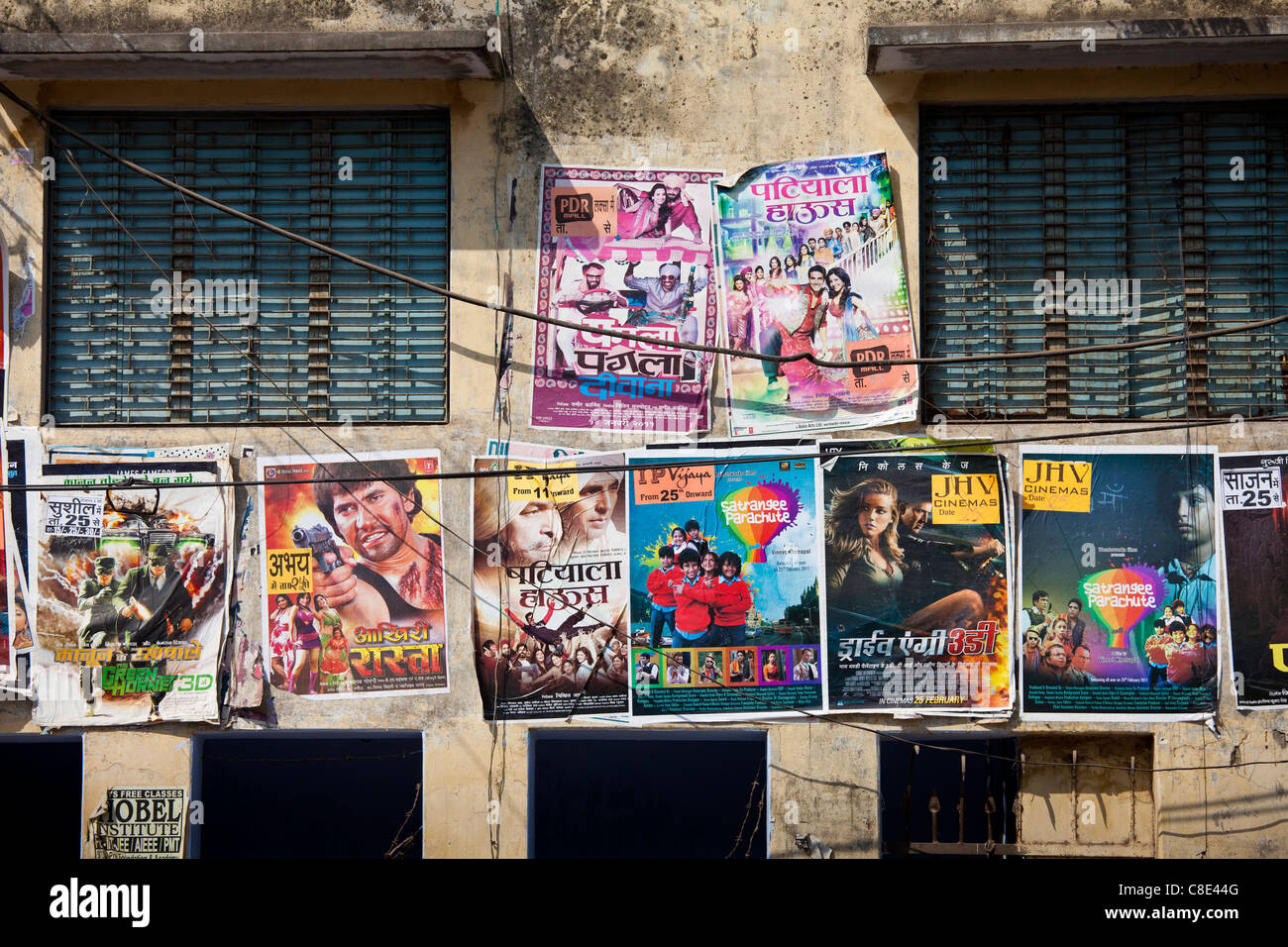 Indian movie posters, Bollywood, in the city of Varanasi, Benares, Northern India Stock Photo