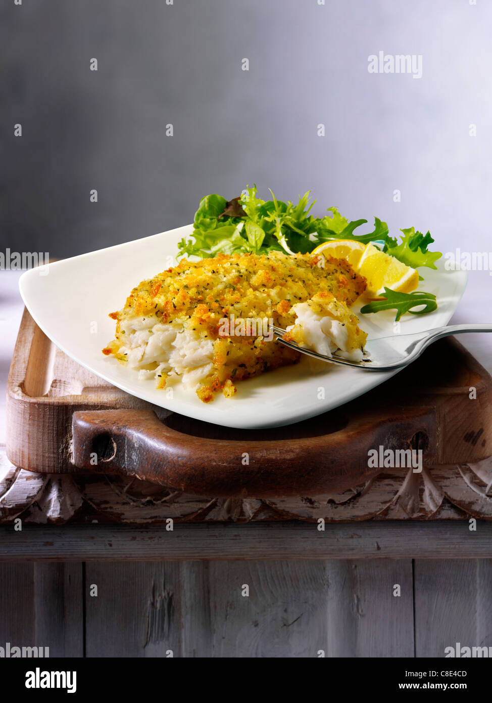 Lightly Battered Sole served on a plate on a table Stock Photo