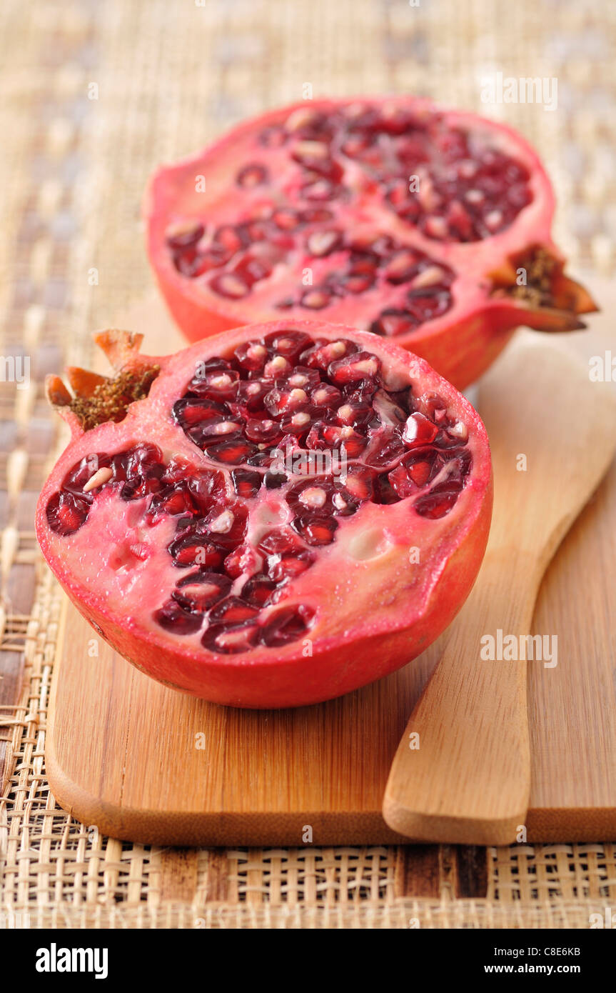 Pomegranate cut in half Stock Photo