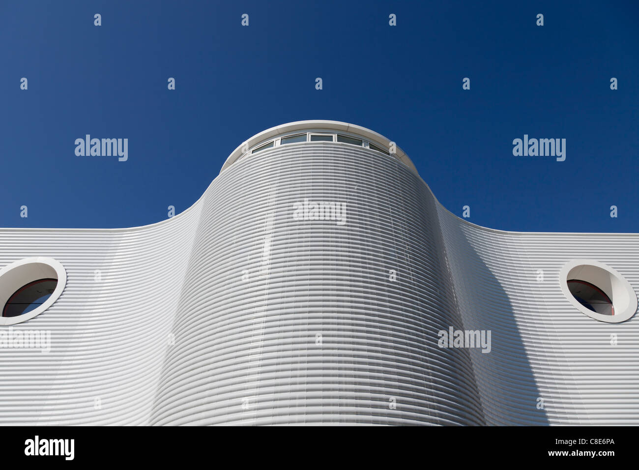 the curved and louvered, white exterior of the Eastpoint Centre in Southampton Stock Photo