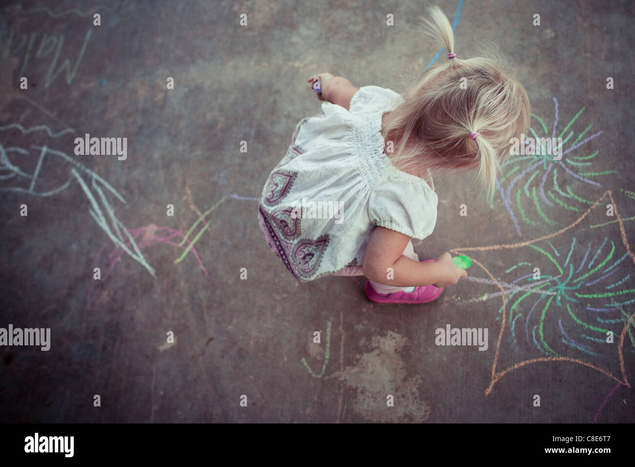 Overhead View of Toddler Playing with Sidewalk Chalk Stock Photo Alamy