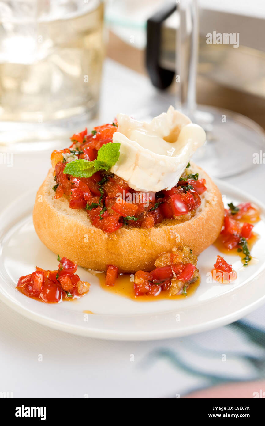 Goat's cheese and preserved tomato open sandwich Stock Photo Alamy