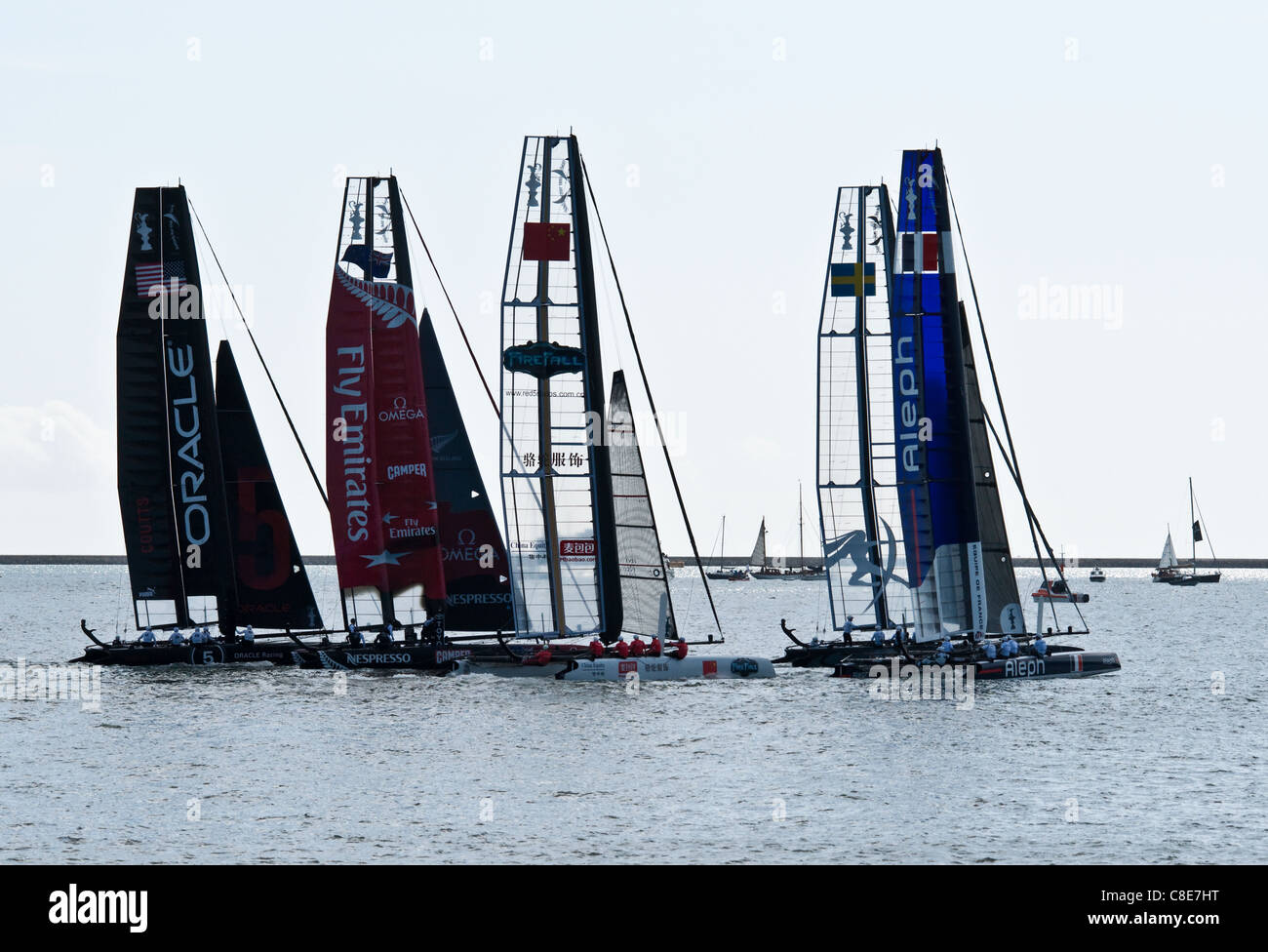 Five of the Americas Cup 2011 teams set off for a race in Plymouth Sound Stock Photo