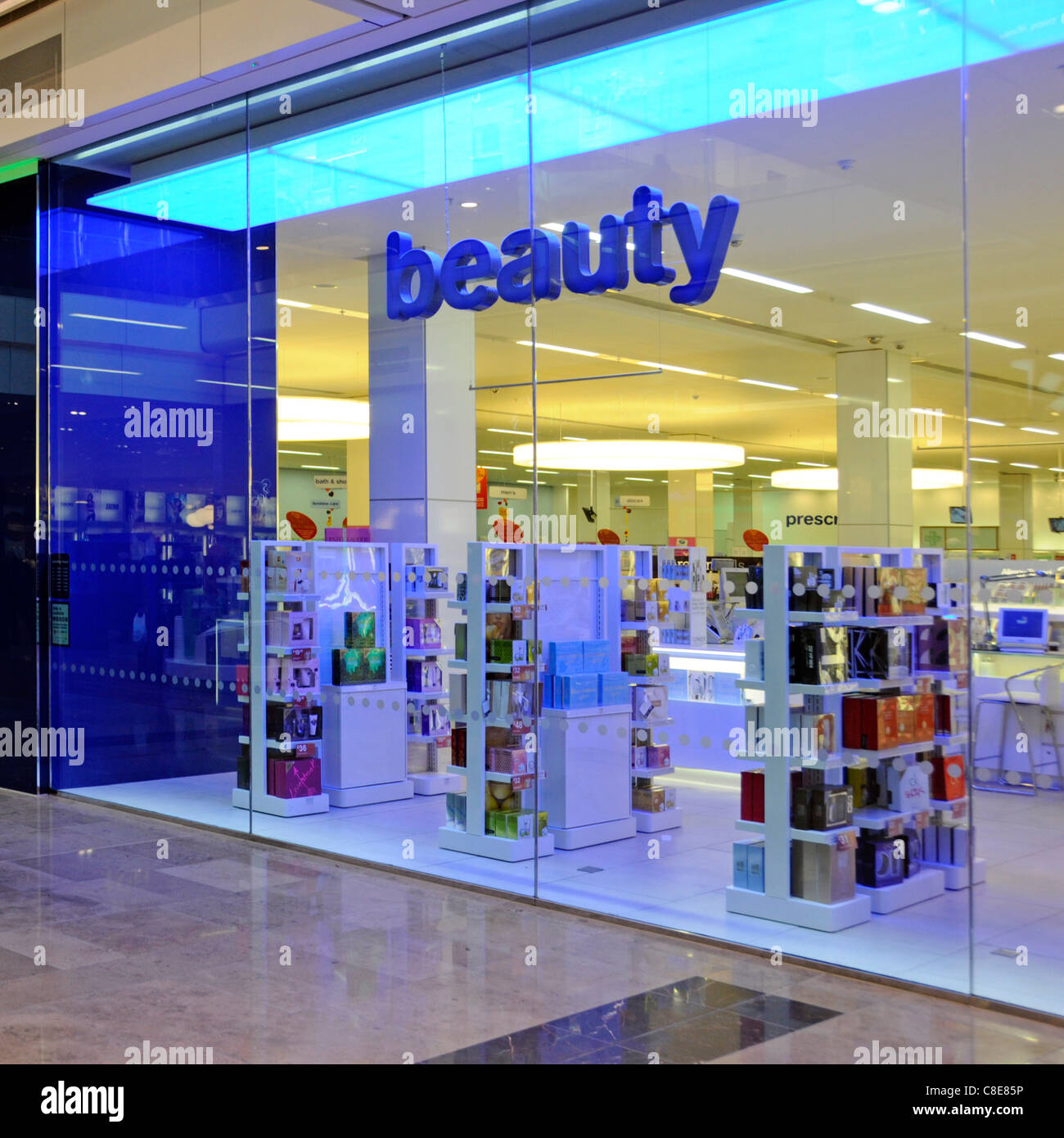 Boots retail pharmacy business chemist beauty products shop front & window in Westfield shopping centre mall in Stratford City East London England UK Stock Photo