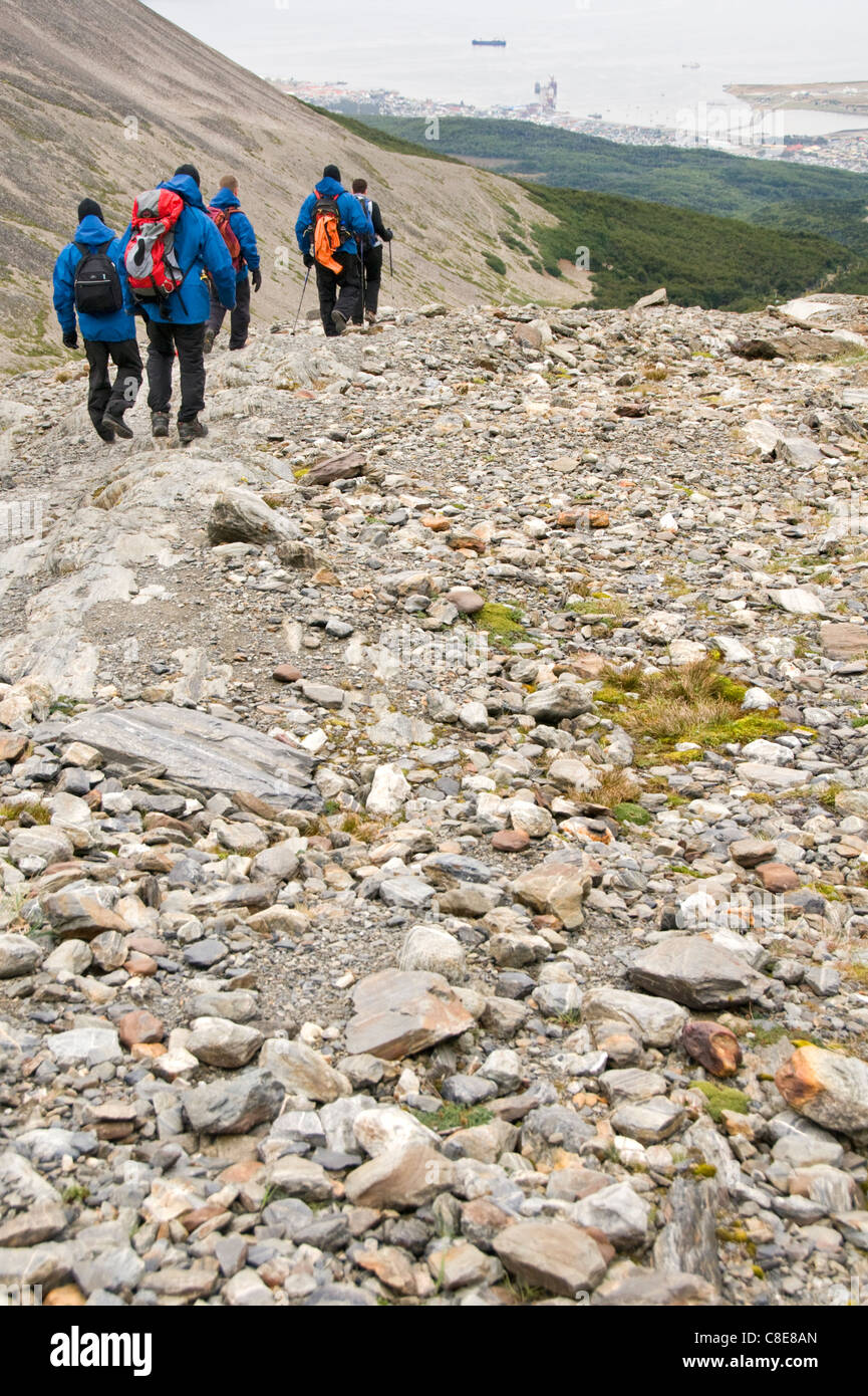 Hikers walking down from the Martial glacier in Ushuaia, Argentina Stock Photo