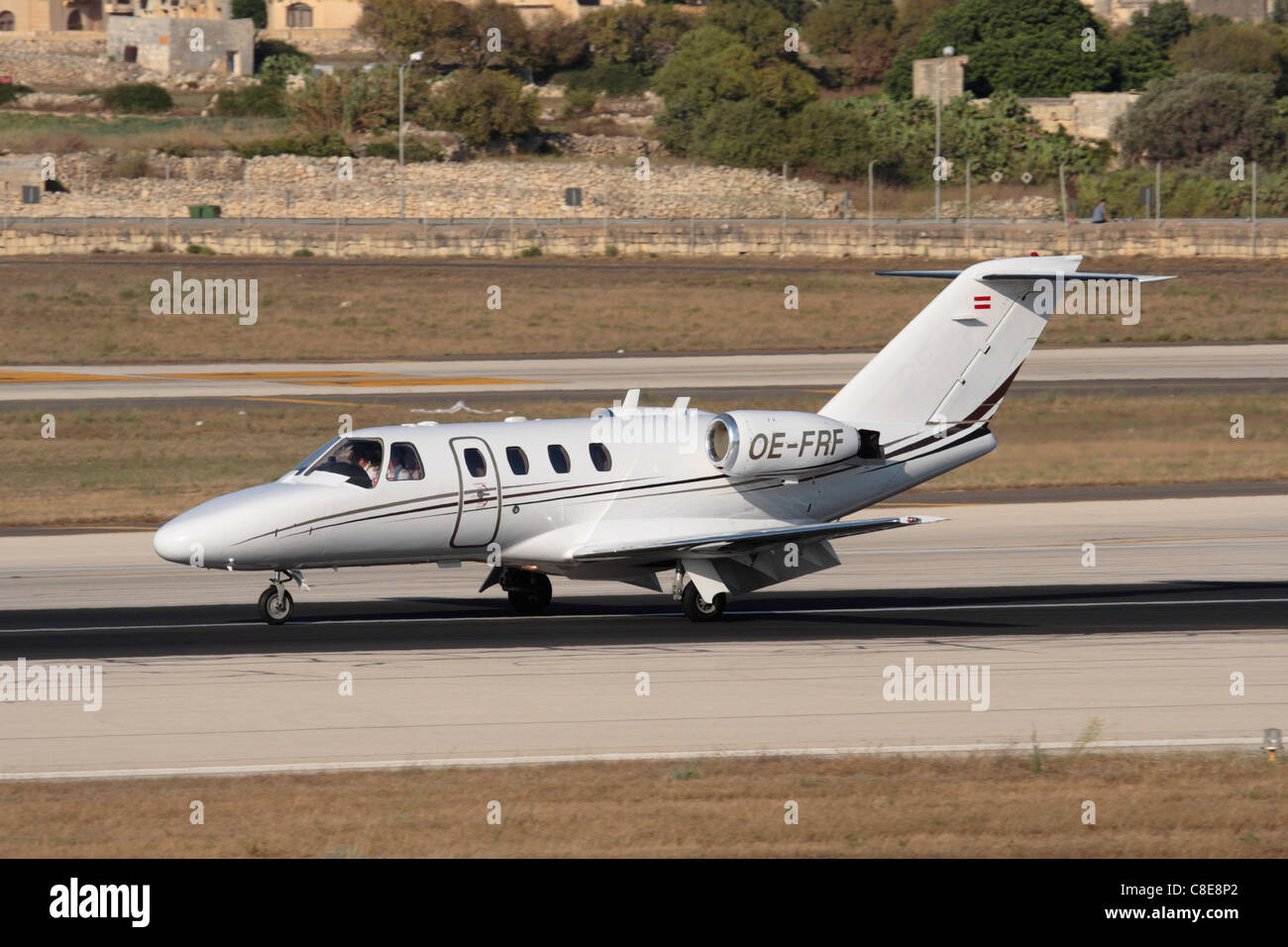 Cessna Citation CJ1 small private jet on runway after landing Stock Photo
