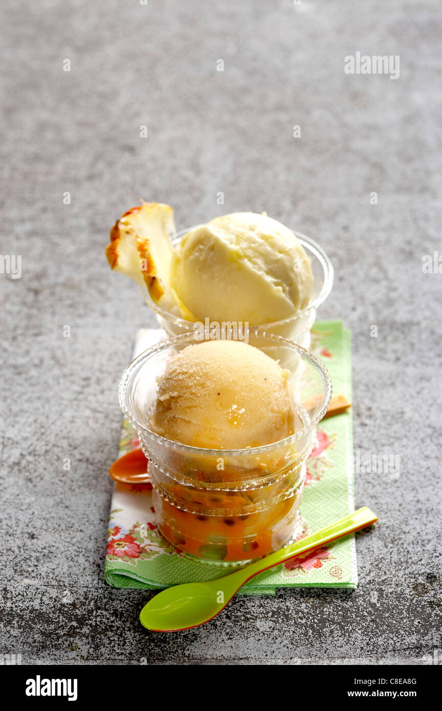 Banana,passion fruit and pineapple ice cream dish Stock Photo Alamy