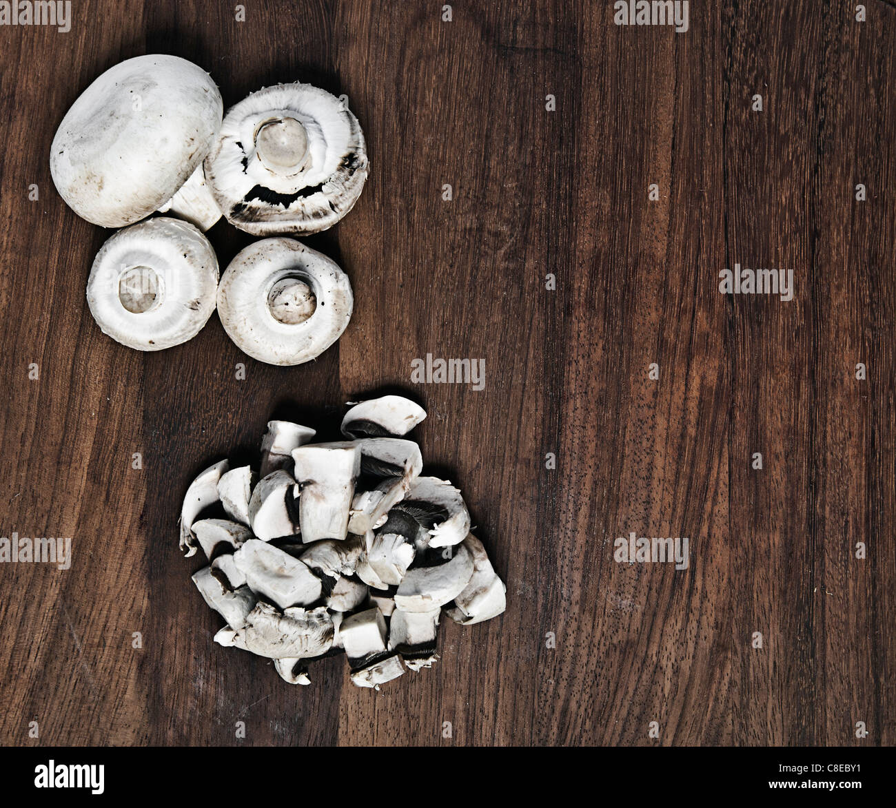 Mushrooms on a Chopping Board Stock Photo
