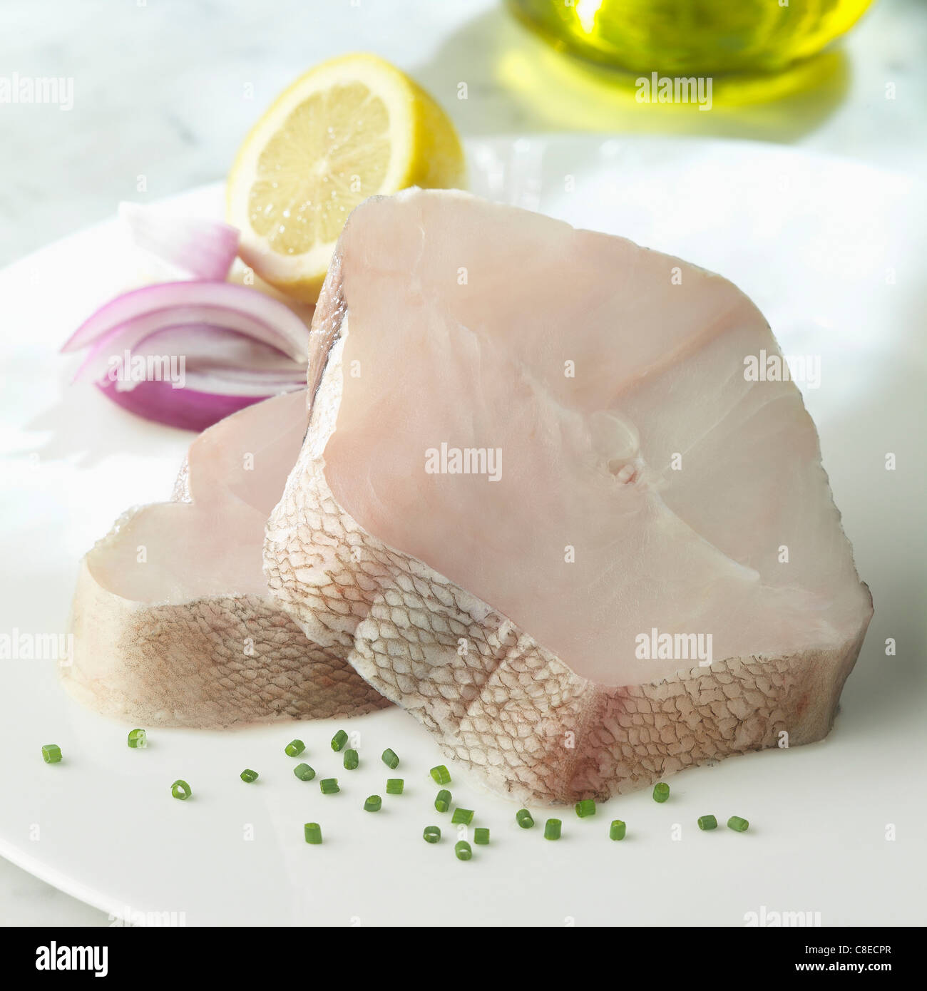 Raw white fish steaks Stock Photo Alamy