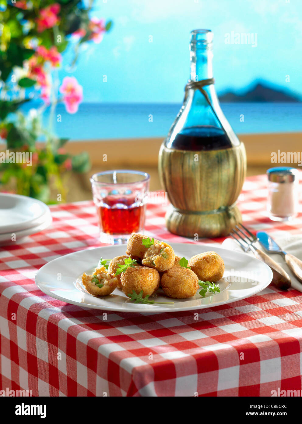 Rice and pea Croquettes on a terrace in Sicily Stock Photo