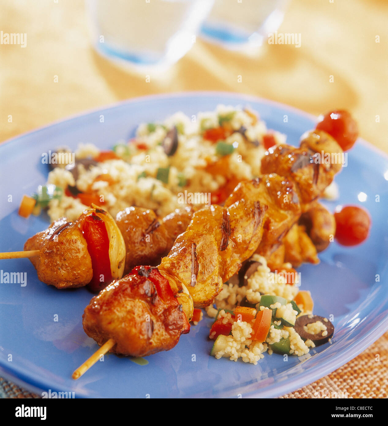 Spicy chicken brochettes with tabbouleh Stock Photo