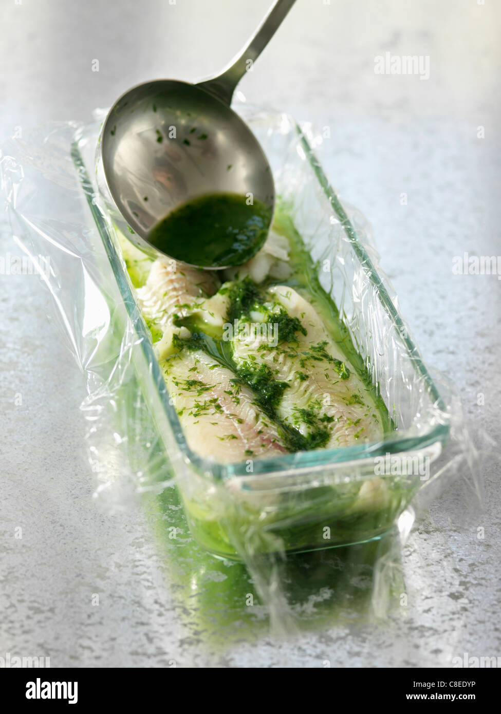 Adding a ladle of gelatine Stock Photo