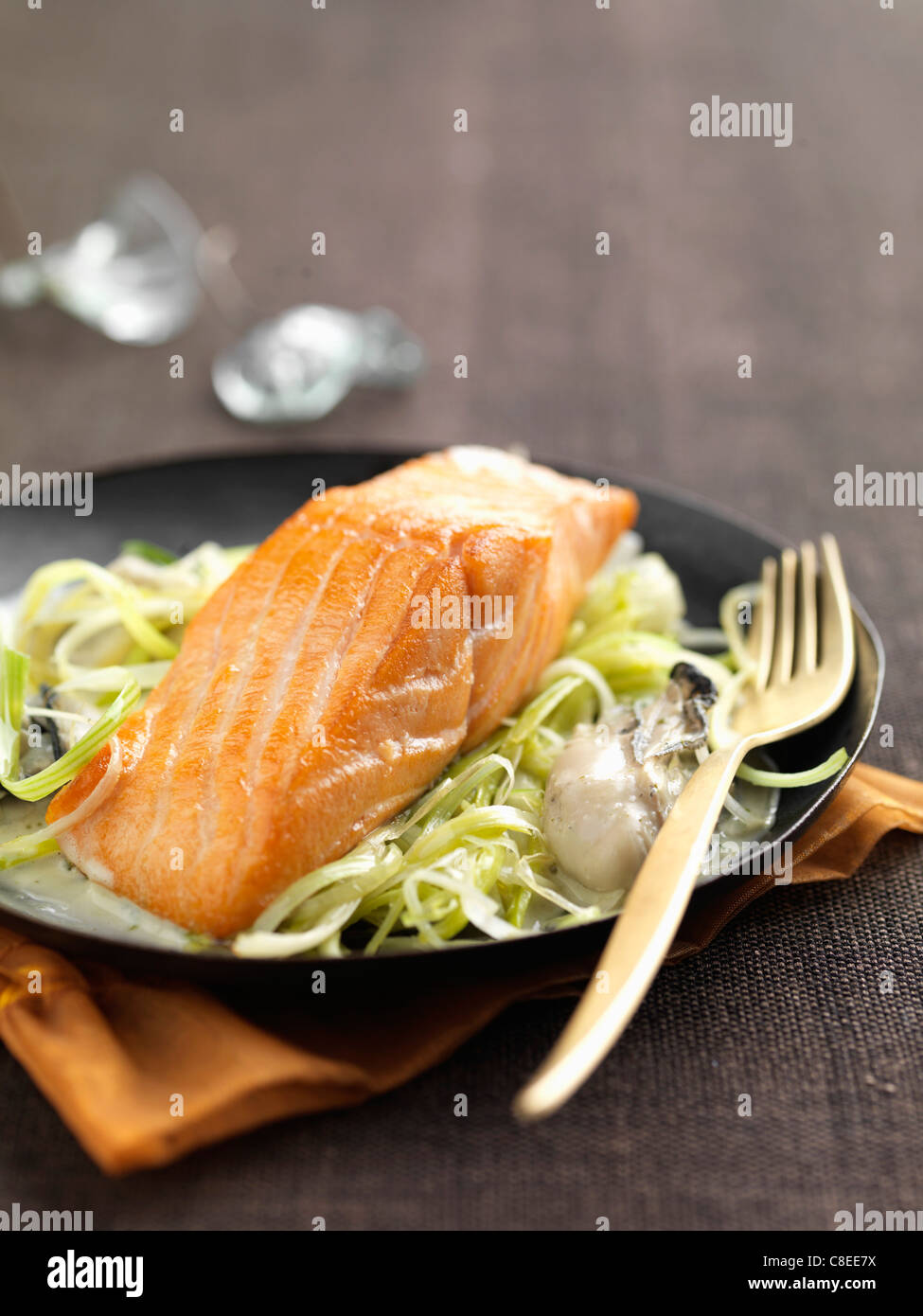 Piece of salmon with oyster sauce Stock Photo Alamy