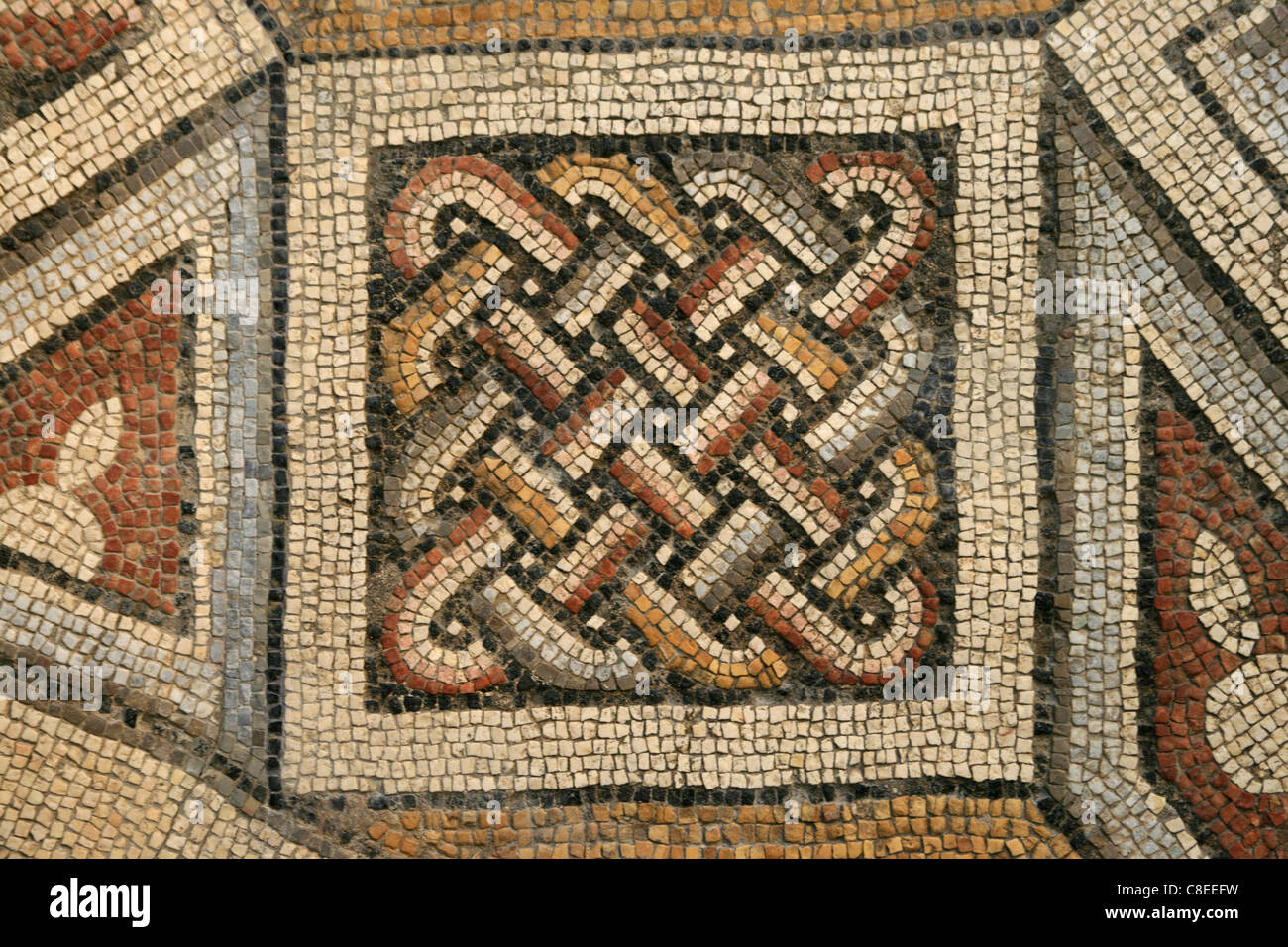 Roman tile mosaic detail with interlace pattern Stock Photo