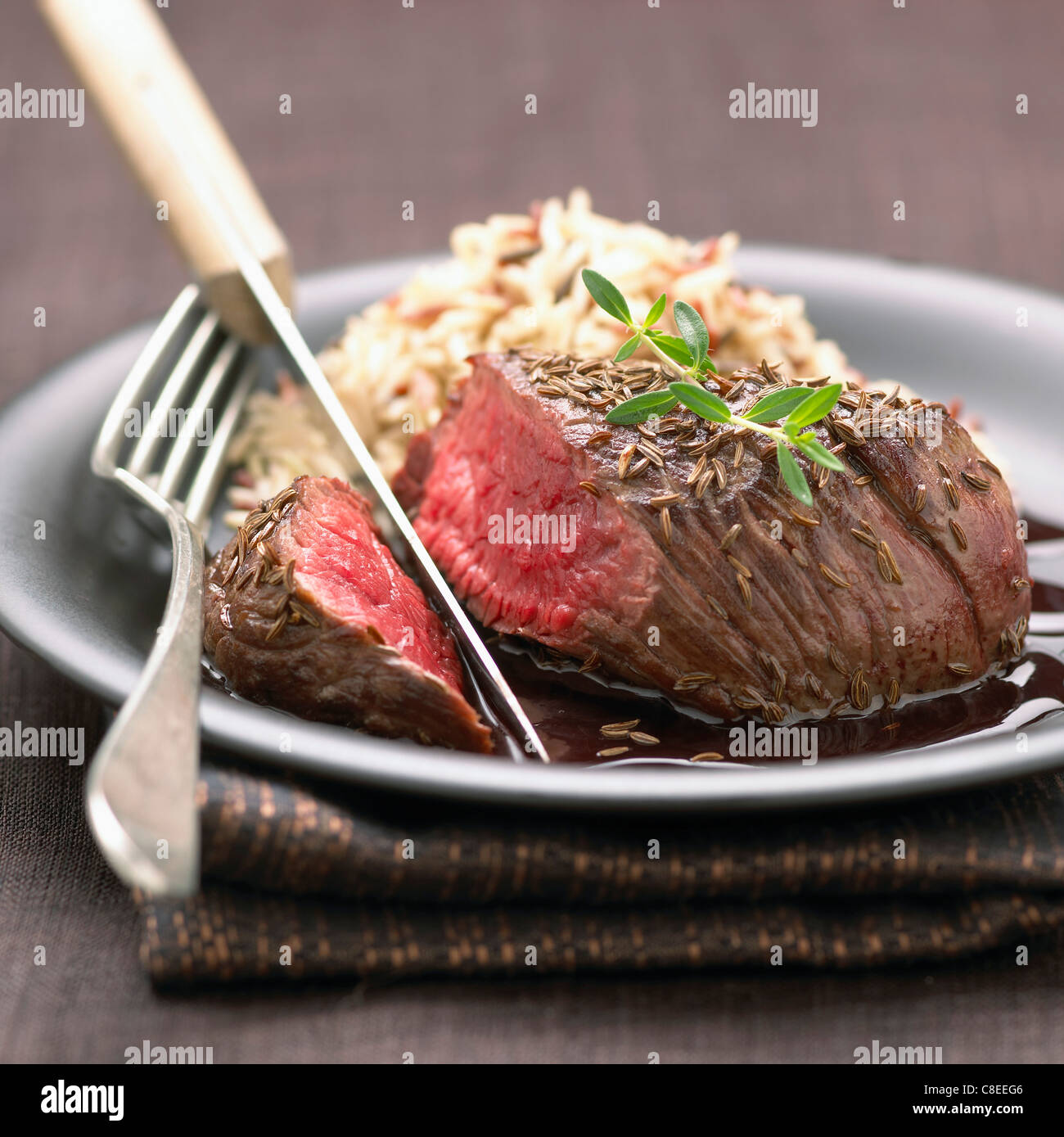 Rare cooked bull's meat Stock Photo - Alamy