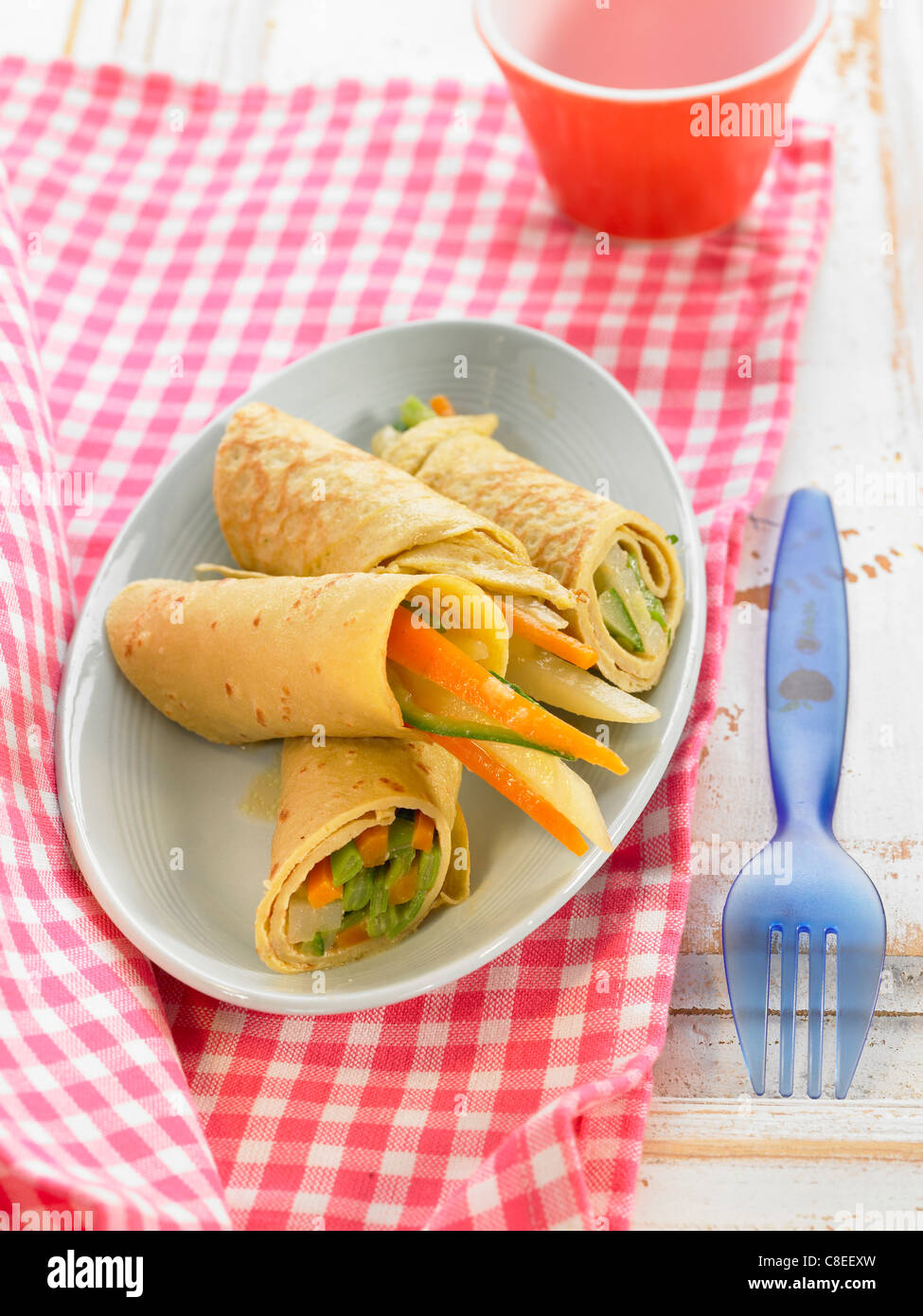Rolled pancakes filled with vegetables and miso Stock Photo