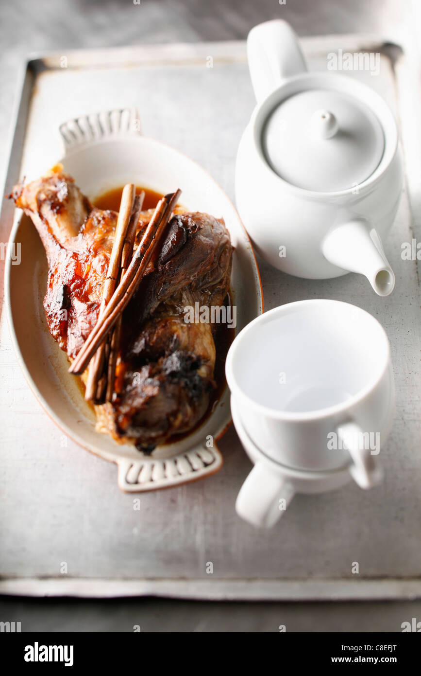 Roast knuckle of pork with cinnamon Stock Photo