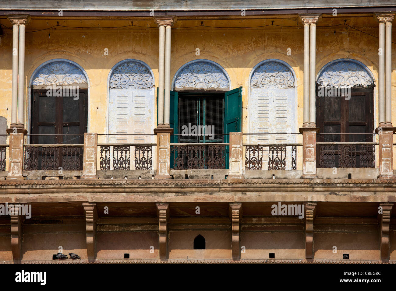 Indian architecture at the Ghats overlooking the Ganges River in City of Varanasi, Benares, Northern India Stock Photo