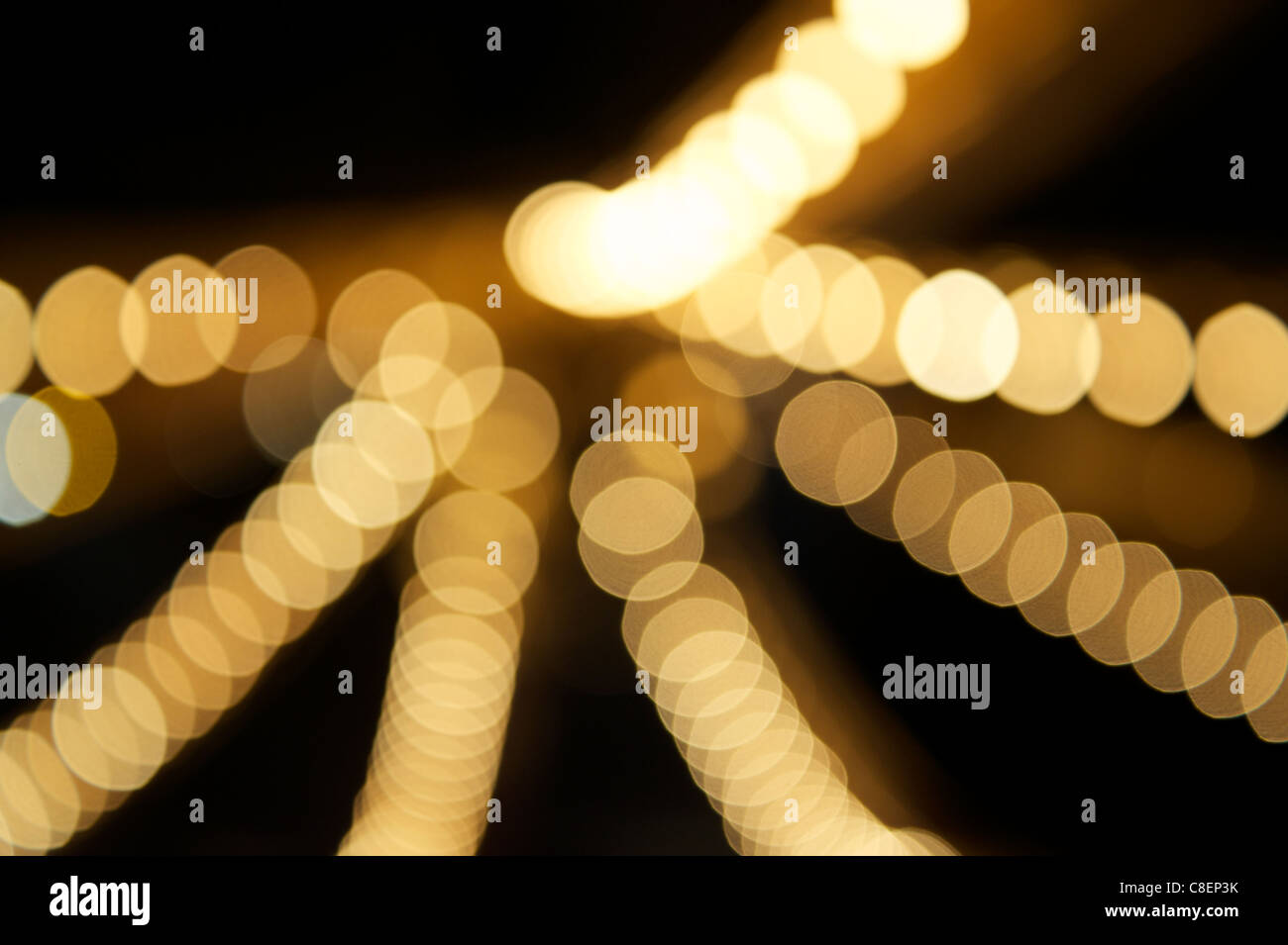 Abstract out of focus background of strings of lights Stock Photo