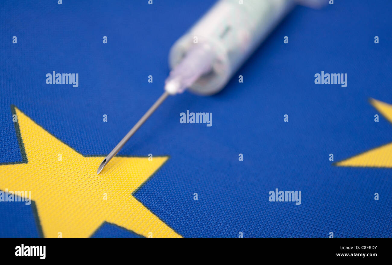 Financial Injection - Medical Syringe With Banknote one Flag of European Union Stock Photo