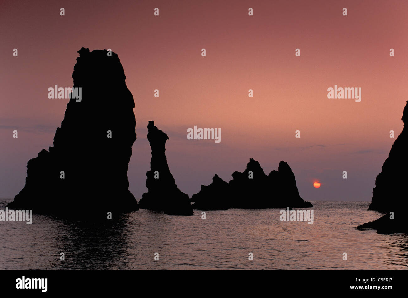 Sunset, Sea, stacks, Aiguilles de Port Coton, Belle Ile, Bretagne, France, Europe, sun, water Stock Photo