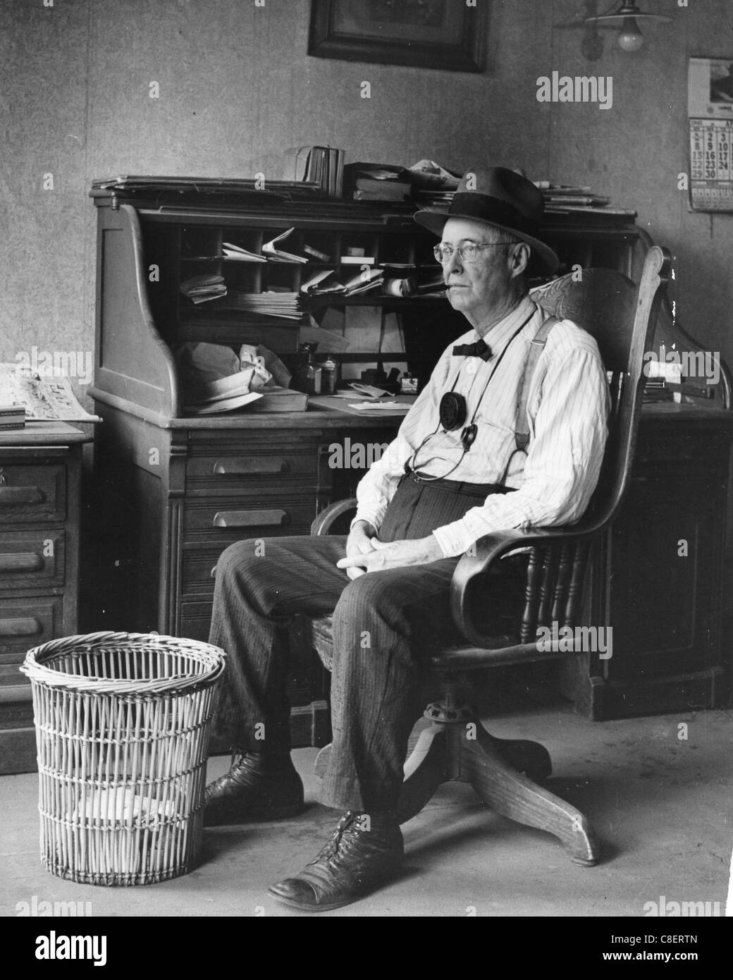 US SMALL TOWN LAWYER Sam Van Poll in his Lamar. Missouri, office about