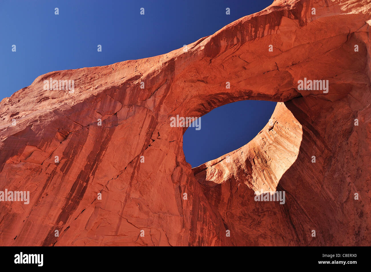 Suns eye, Rock Arch, Navajo, Indian Reservation, Monument Valley, Tribal Park, Arizona, USA, United States, America, hole Stock Photo