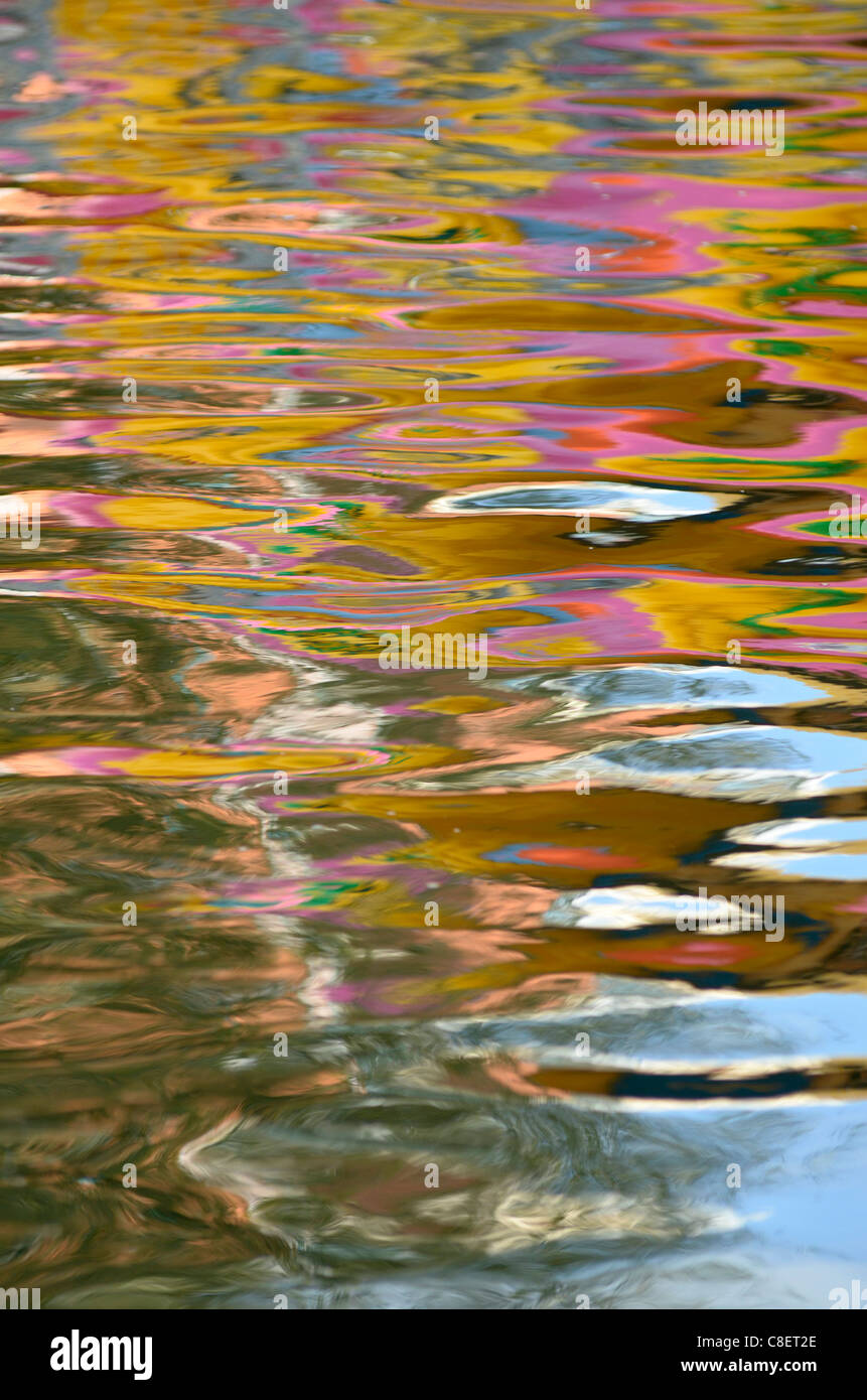 Reflections in canal water in Oracle shopping center Reading UK Stock Photo