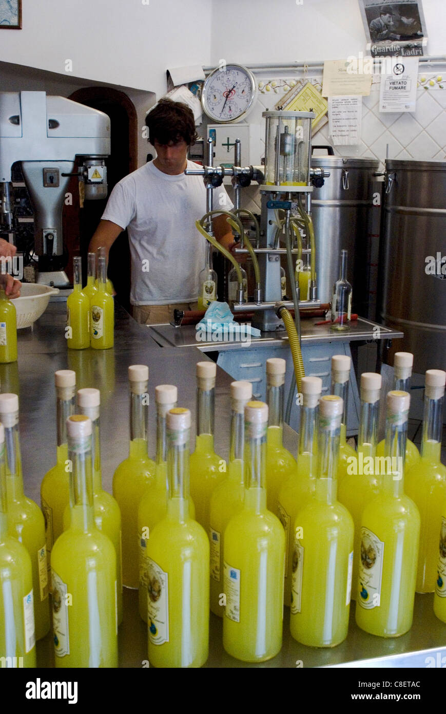 Bottling at a Limoncello (liquer) factory, Amalfi, Campania, Italy Stock Photo
