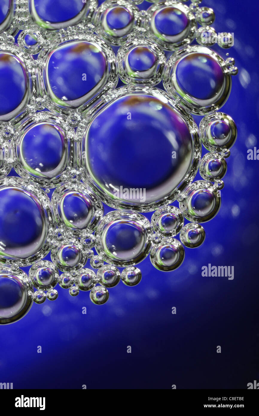 lots of bubbles forming beautiful intricate pattern with space for text Stock Photo