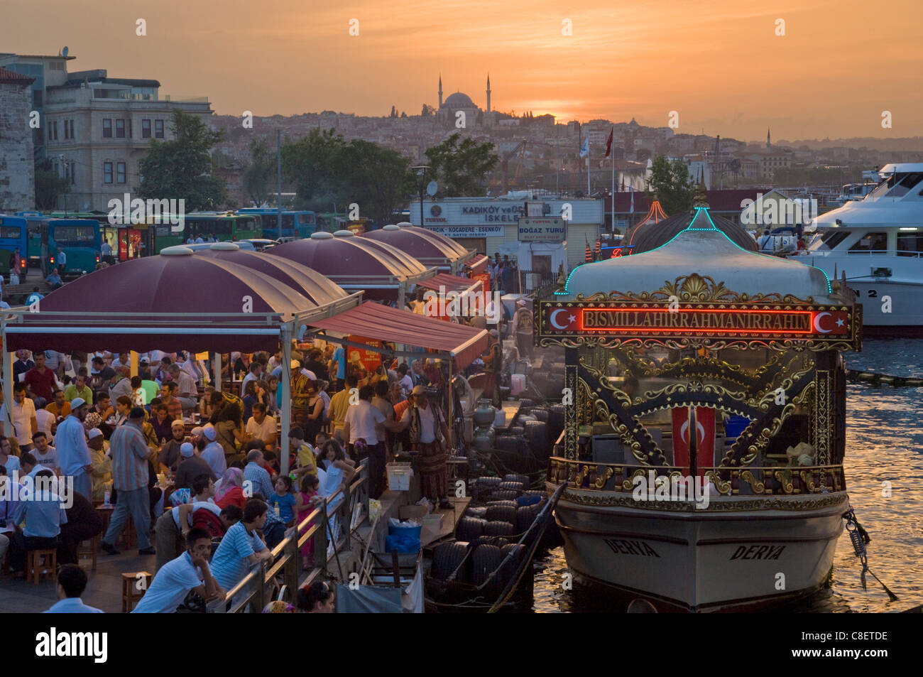 Traditional boats cooking and selling food, Eminonu, Galeta bridge, Istanbul, Turkey Stock Photo