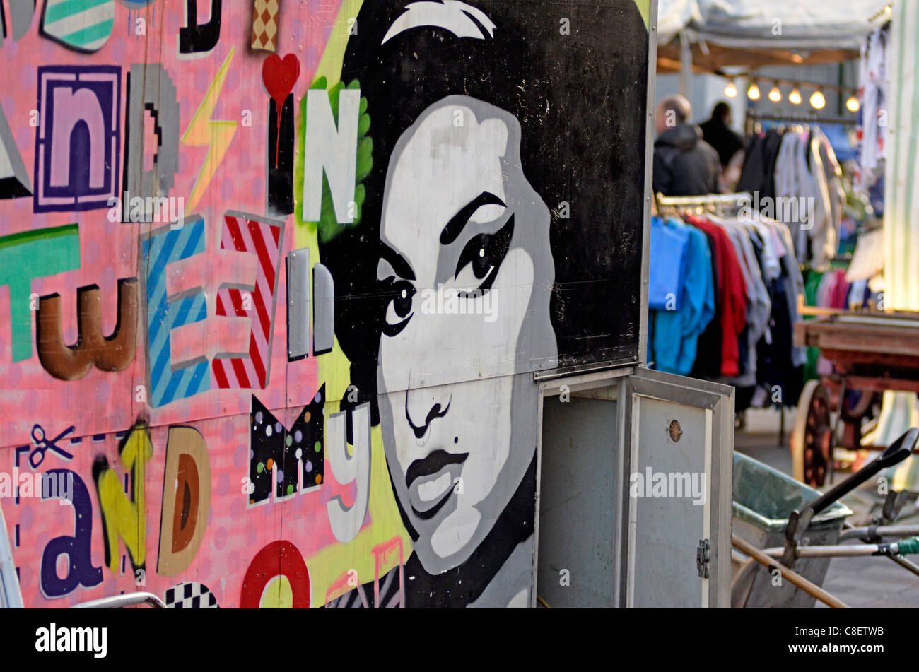 Amy Winehouse picture on stall van Camden market London UK Stock Photo