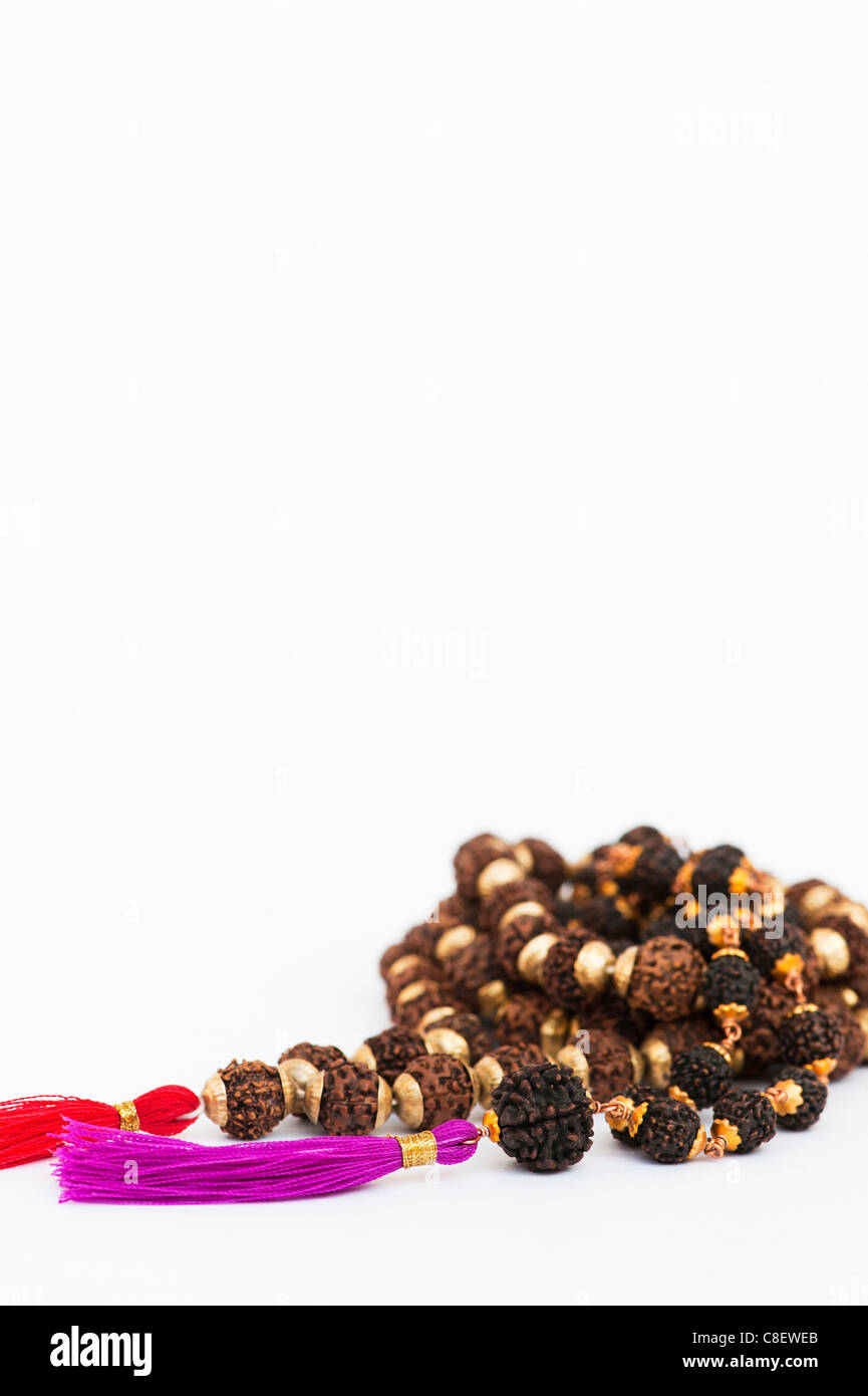 Indian Rudraksha / Japa Mala prayer beads on white background Stock Photo