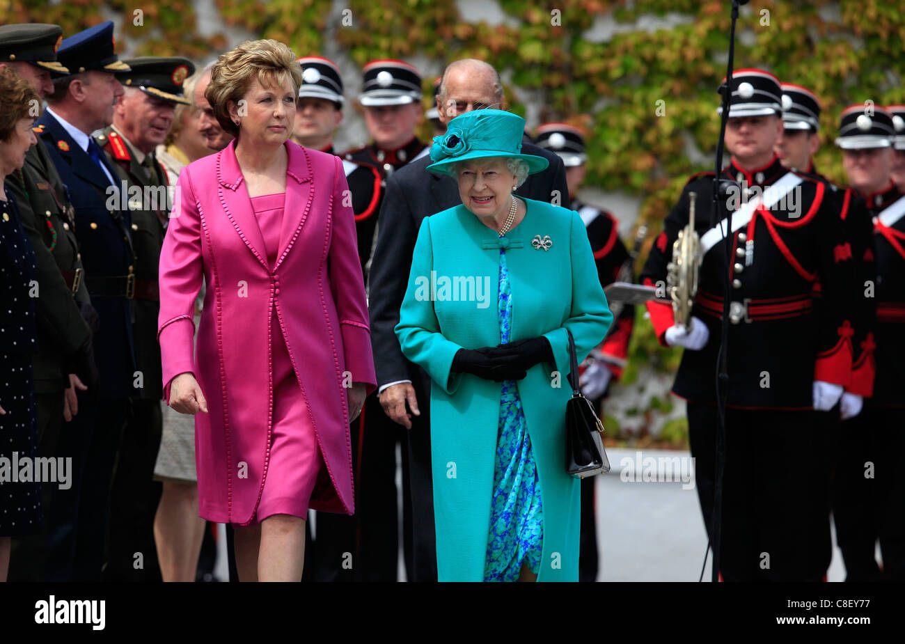 Queen Elizabeth II (2nd R) and Prince Philip, Duke of Edinburgh (R) are greeted by Irish President Mary McAleese (2nd L) Stock Photo