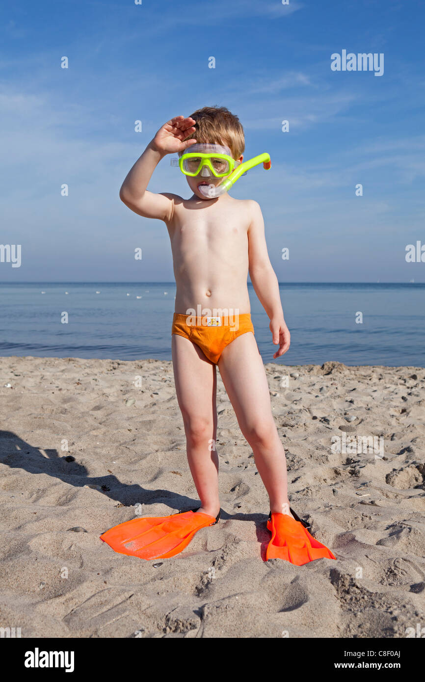 young boy with flippers, diving goggles and snorkel at the beach,  Kuehlungsborn, Mecklenburg-West Pomerania, Germany Stock Photo - Alamy
