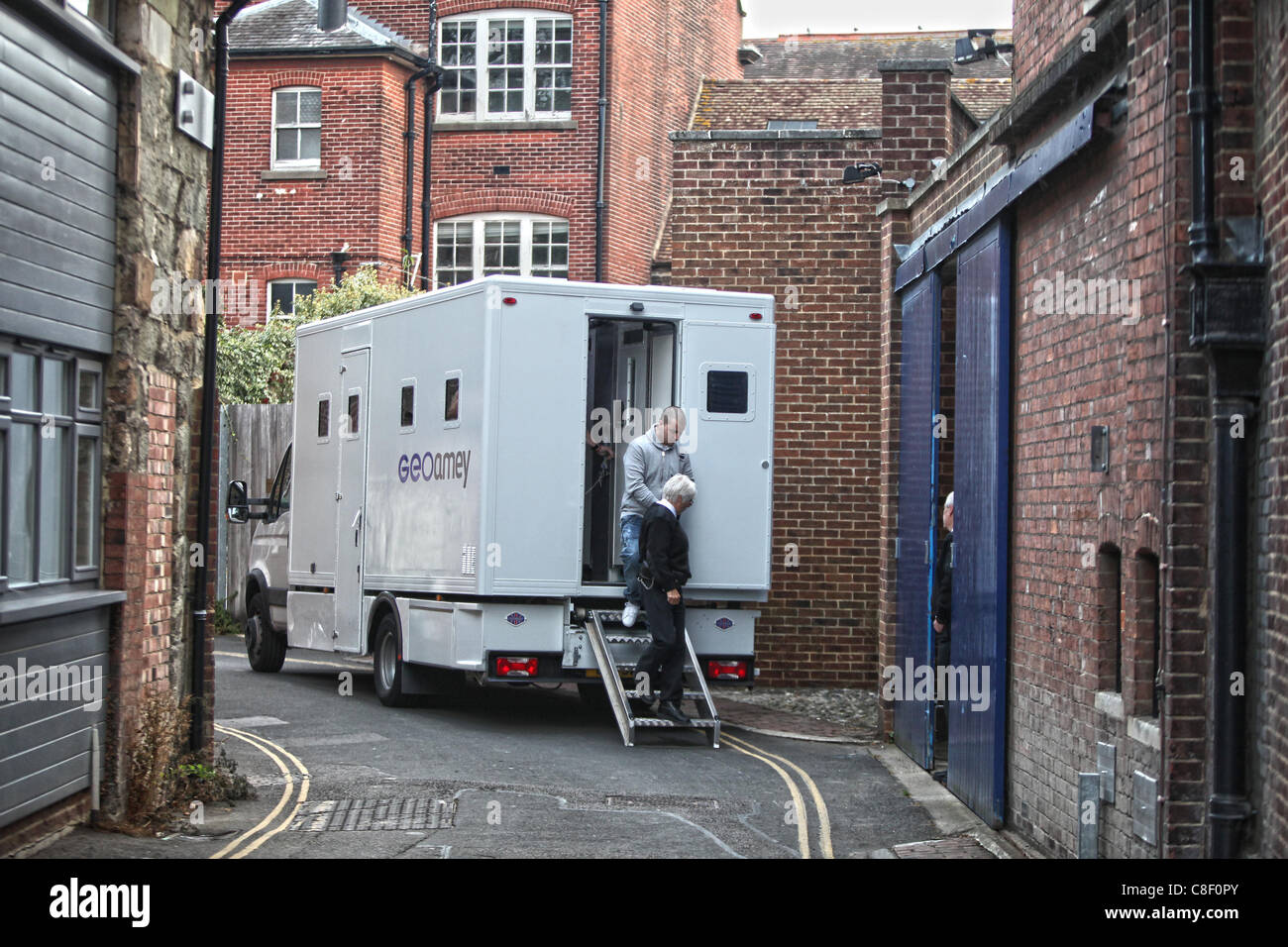 A prisoner arrives at court in a GEOamey prison van. Picture by James Boardman. Stock Photo