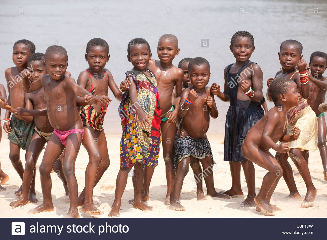 Young Congolese children play on the beach of the Congo