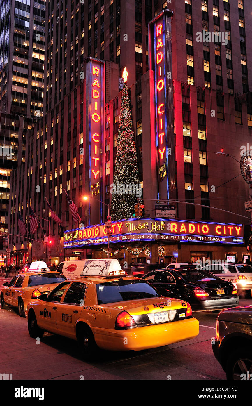 Radio City, Music Hall, 6th Avenue, Rockefeller Center, Manhattan, New York, USA, United States, America, night, taxi Stock Photo