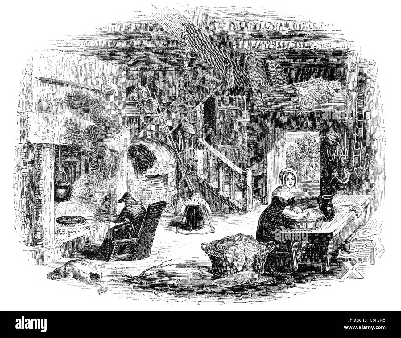 fireplace of old English cottage Heritage stove kitchen living room dining chair firesmoke chimney peasant poor country Stock Photo