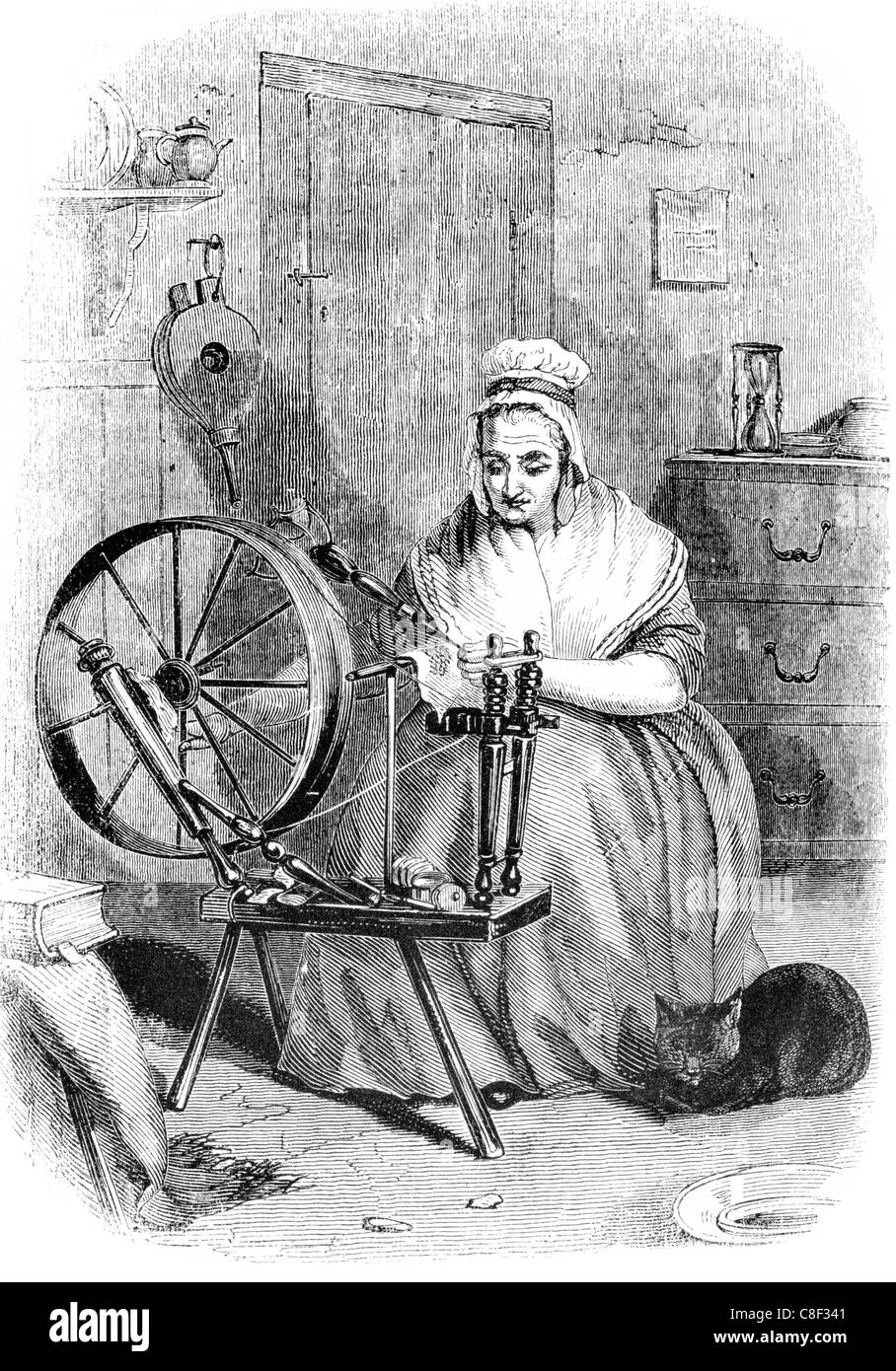 Saxony spinning wheel yarn spindle lady ladies jenny frame flax long draw linen hand powered made flywheel Stock Photo