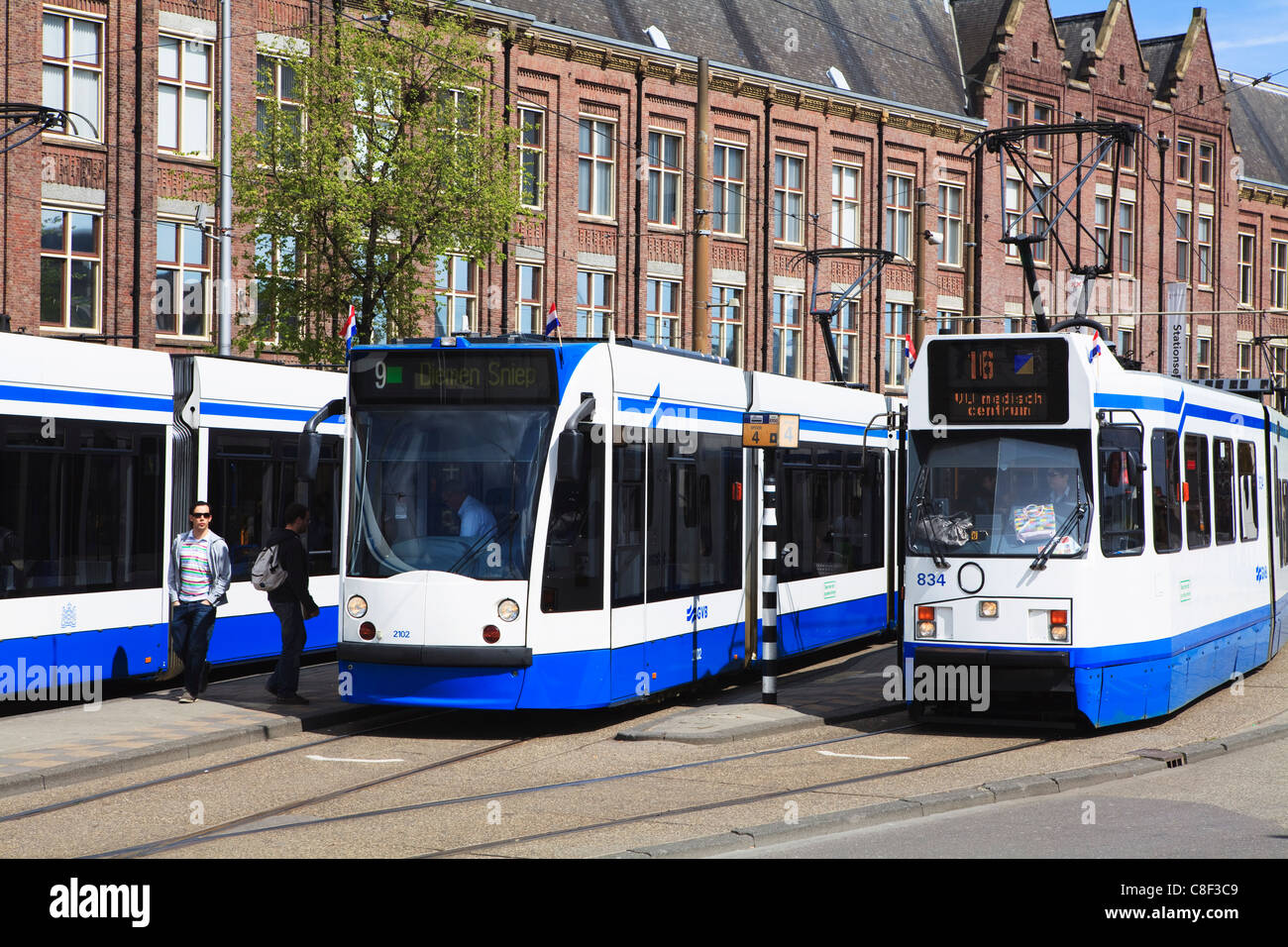 Centraal Station and trams, Amsterdam, Netherlands Stock Photo