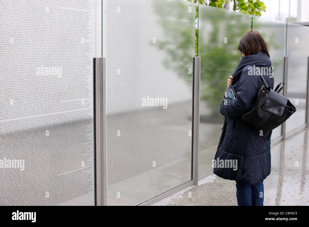 Wall of names at the Royallieu Transit Camp memorial, Compiegne, Oise, France Stock Photo