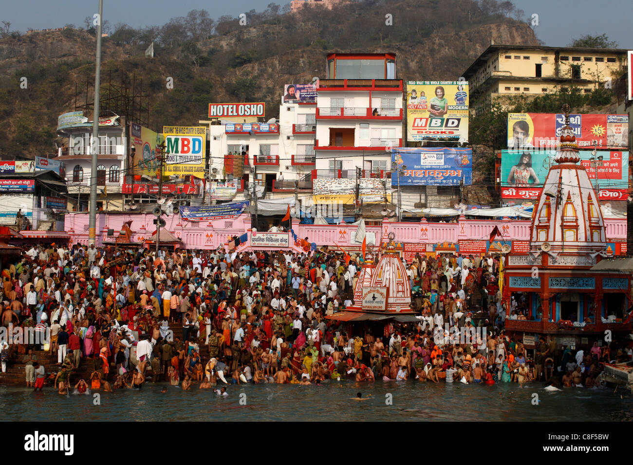 Devotees converge in Haridwar at Navsamvatsar, a Hindu holiday during Maha Kumbh Mela festival, Haridwar, Uttarakhand, India Stock Photo
