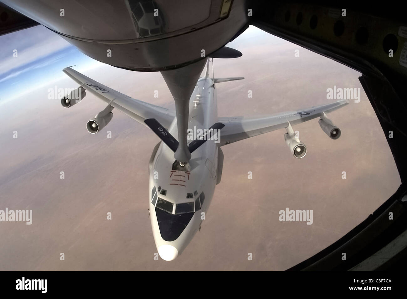 A KC-135 Stratotanker from Fairchild Air Force Base, Wash., refuels an E-3 Sentry from Tinker AFB, Okla. Stock Photo