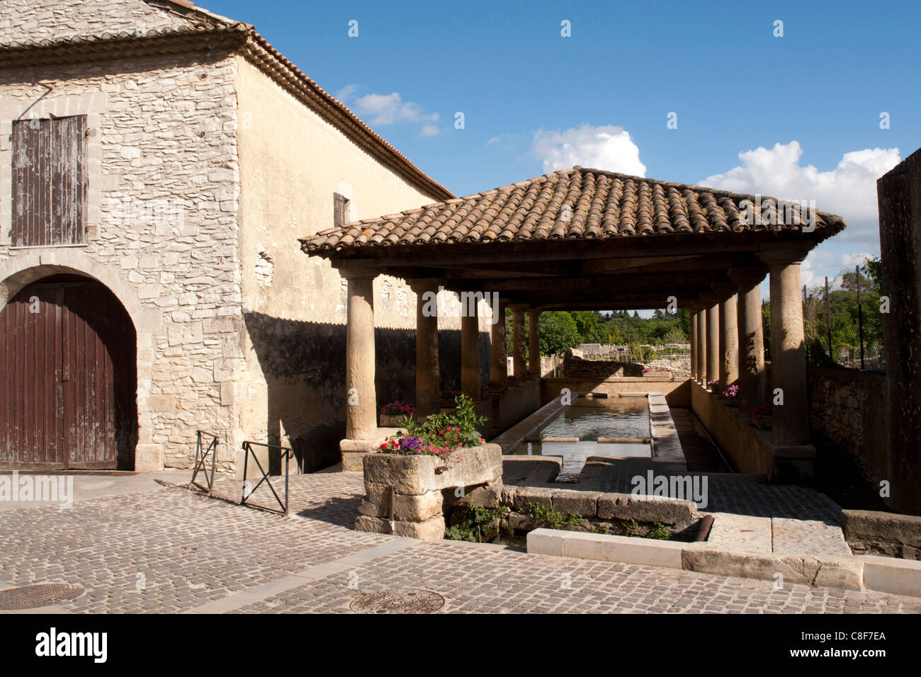 France, Gard, Languedoc-Roussillion, Tavel, washing house, pump room, architecture, flowers, buildings, constructions, columns, Stock Photo