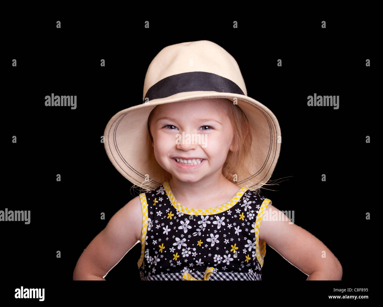 A very happy girl wearing a hat Stock Photo Alamy