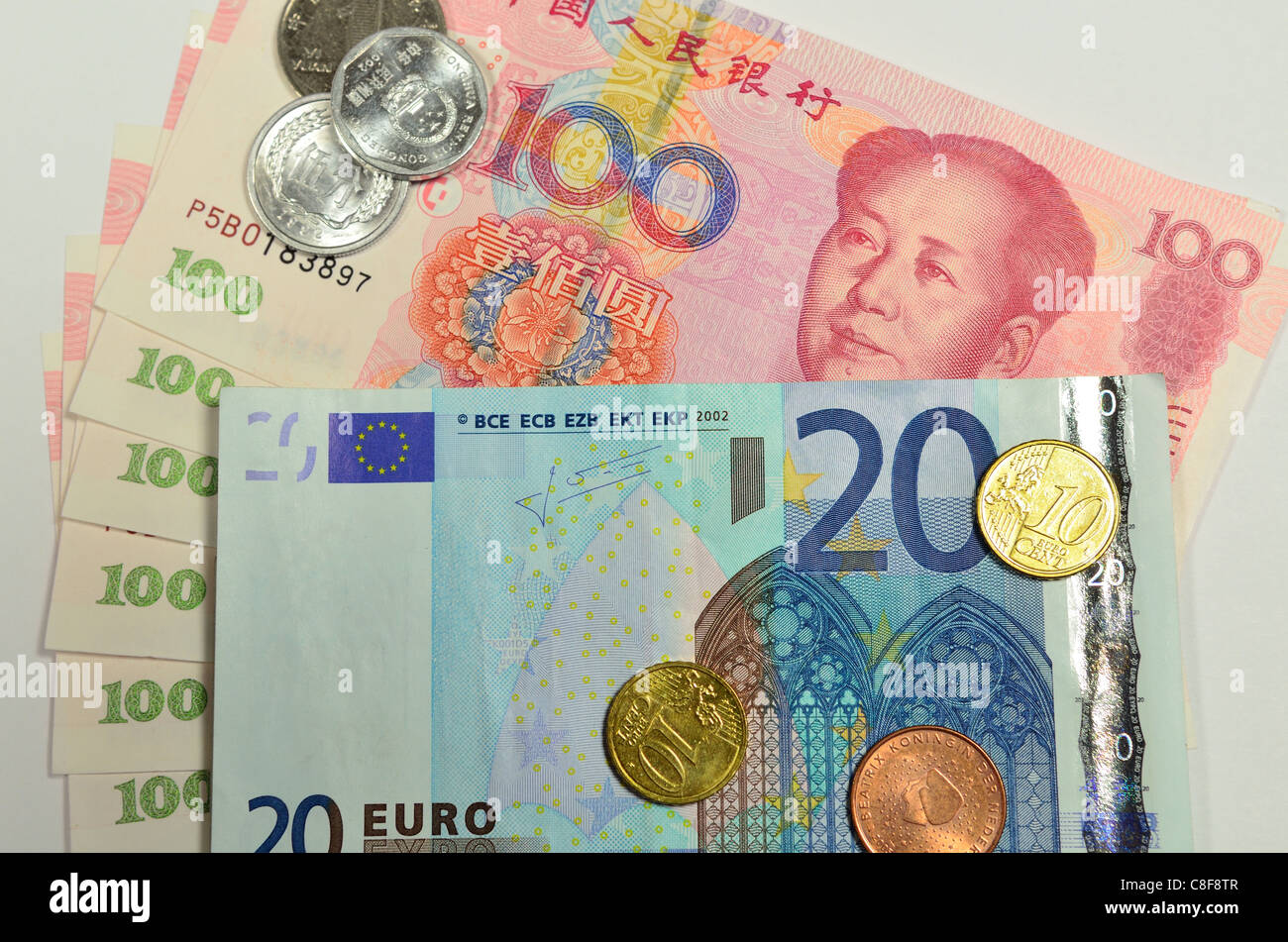 Euro And Chinese Yuan Bank Notes And Coins Stock Photo Alamy